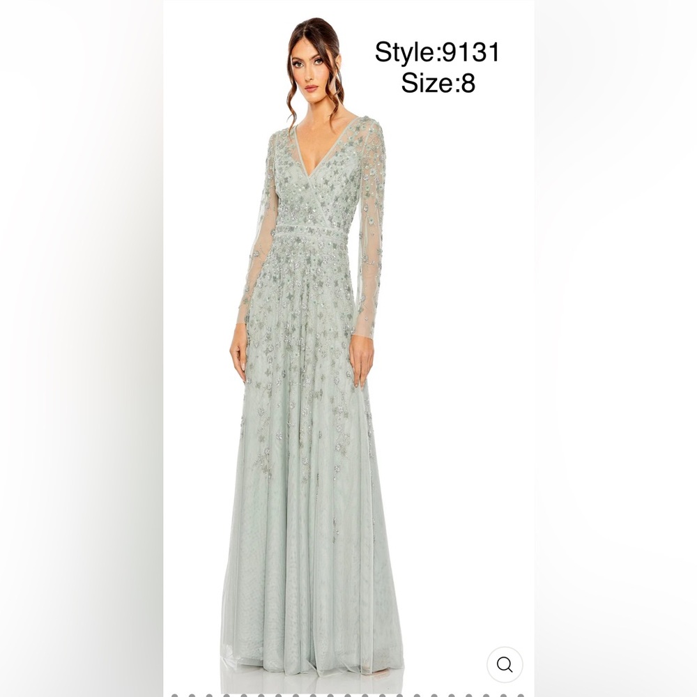 Embellished wrap over long sleeve A-line gown